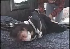 Valentina holding a bolt black strong in her spy massage porn mouth